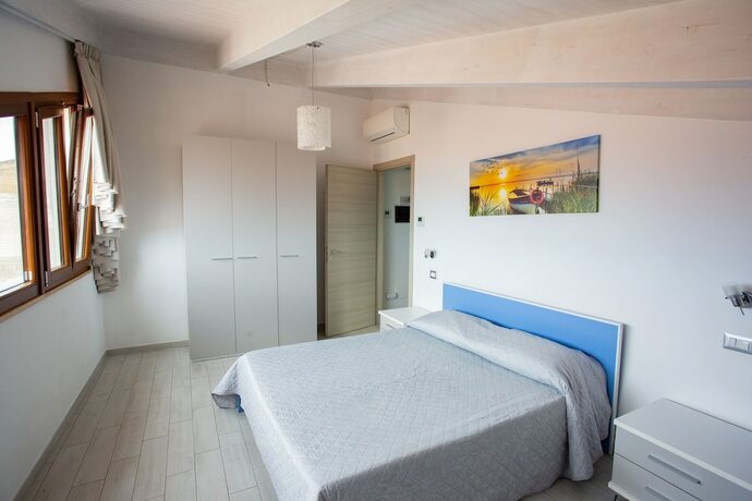Imagen de la habitación del Odissea Residence e Rooms. Foto 14