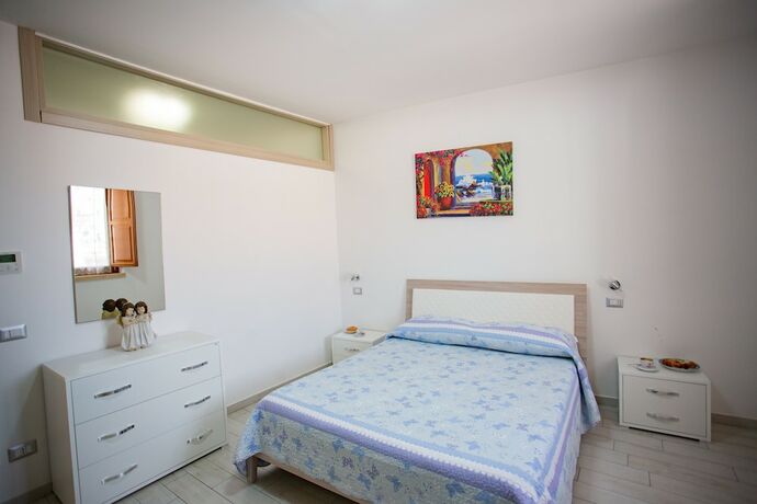 Imagen de la habitación del Odissea Residence e Rooms. Foto 16