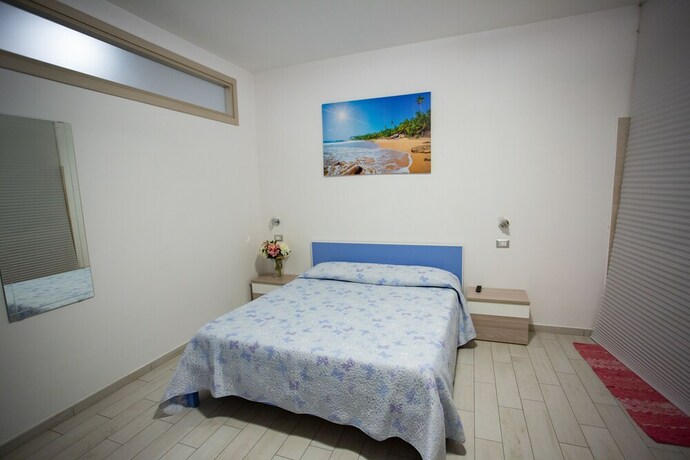 Imagen de la habitación del Odissea Residence e Rooms. Foto 20