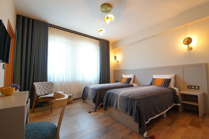 Imagen de la habitación del Oikos Bozcaada. Foto 16