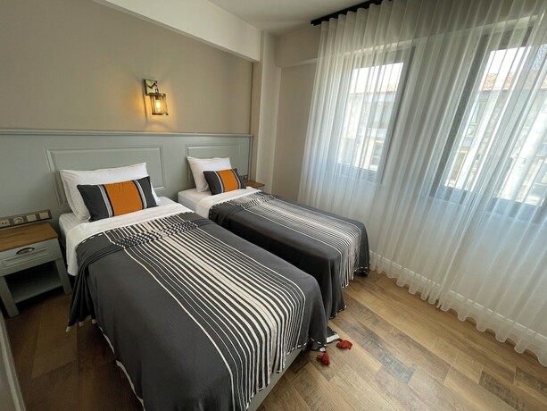 Imagen de la habitación del Oikos Bozcaada. Foto 18
