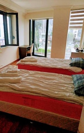 Imagen de la habitación del Old Town Grand Apart Hotel. Foto 15