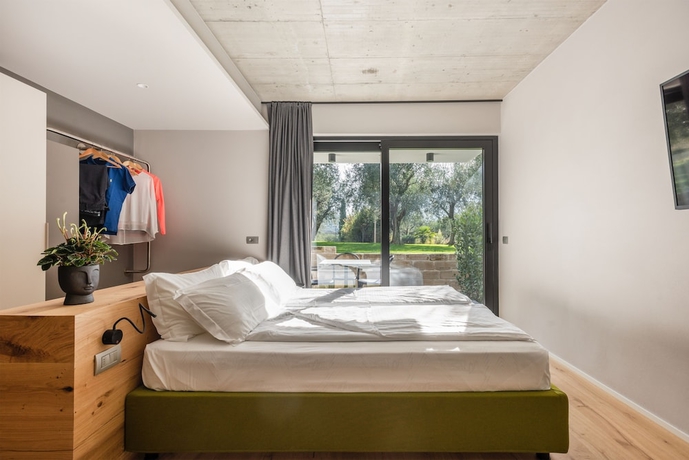 Imagen de la habitación del Oleeva Garda Living. Foto 4