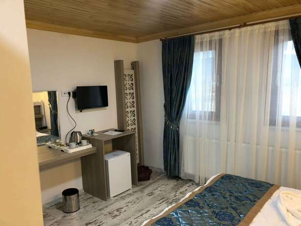 Imagen de la habitación del Olgassys Butik Otel. Foto 19