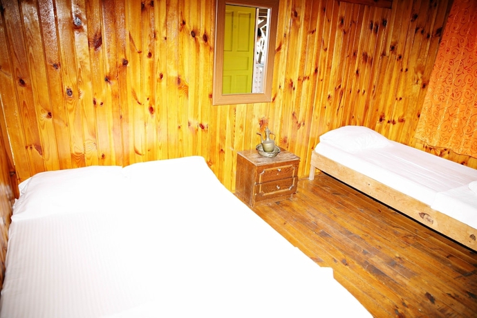 Imagen de la habitación del Olimpos Salinas Wooden Houses. Foto 10