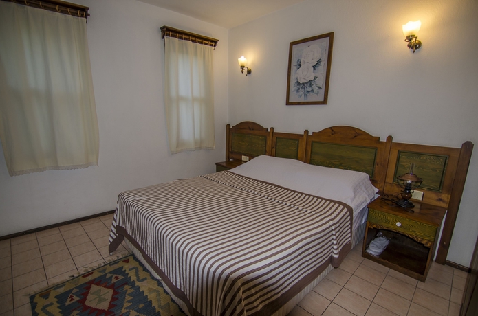Imagen de la habitación del Olive Garden Apart Hotel. Foto 9