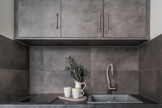 Imagen de la habitación del Olive Green Studios and Apartments. Foto 11