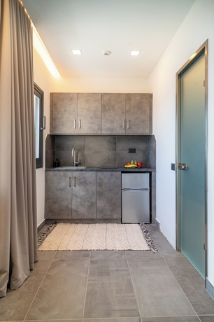 Imagen de la habitación del Olive Green Studios and Apartments. Foto 12