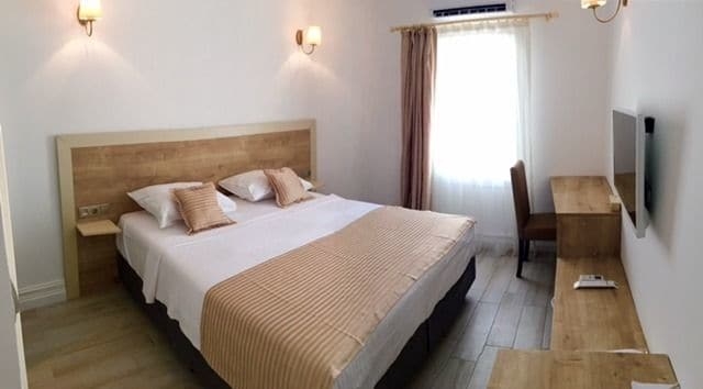 Imagen de la habitación del Olivias Group Hotel. Foto 6