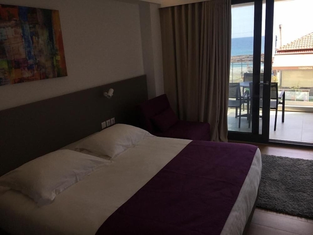 Imagen de la habitación del Olympos Suites Apartments. Foto 6