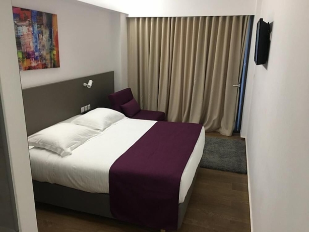 Imagen de la habitación del Olympos Suites Apartments. Foto 7