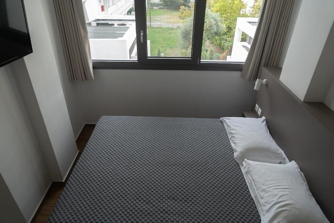 Imagen de la habitación del Olympos Suites Apartments. Foto 15