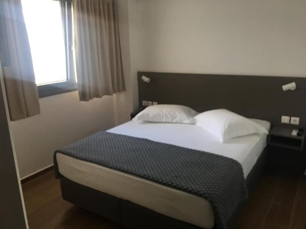 Imagen de la habitación del Olympos Suites Apartments. Foto 16