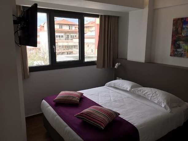 Imagen de la habitación del Olympos Suites Apartments. Foto 17