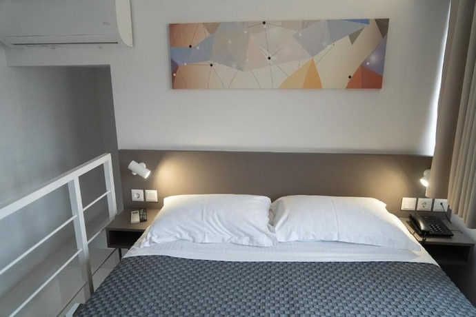 Imagen de la habitación del Olympos Suites Apartments. Foto 19