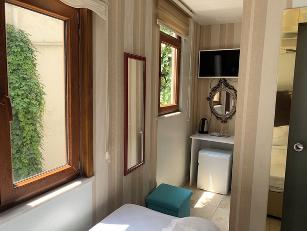 Imagen de la habitación del Omar Sultan Suites. Foto 16