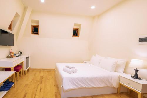 Imagen de la habitación del Omirita Resort Dalat. Foto 17