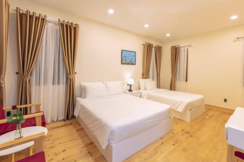 Imagen de la habitación del Omirita Resort Dalat. Foto 19