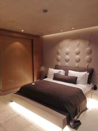 Imagen de la habitación del Omm Inn. Foto 10