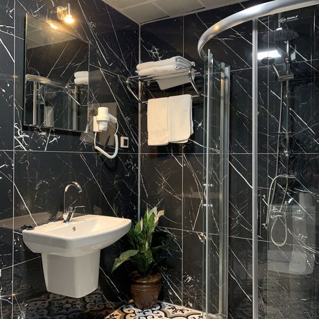 Imagen de la habitación del Omur Hotel. Foto 9