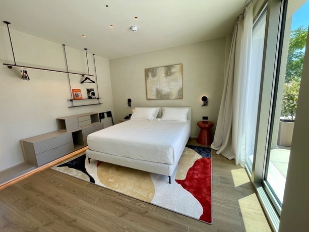 Imagen de la habitación del Opera Suite hotel Pesaro. Foto 3