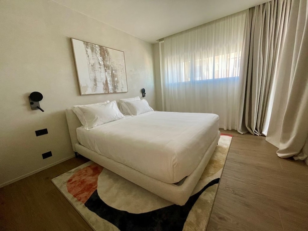 Imagen de la habitación del Opera Suite hotel Pesaro. Foto 9