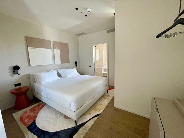 Imagen de la habitación del Opera Suite hotel Pesaro. Foto 13