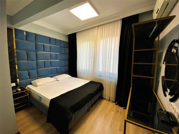 Imagen de la habitación del Orange Airport Hotel. Foto 18