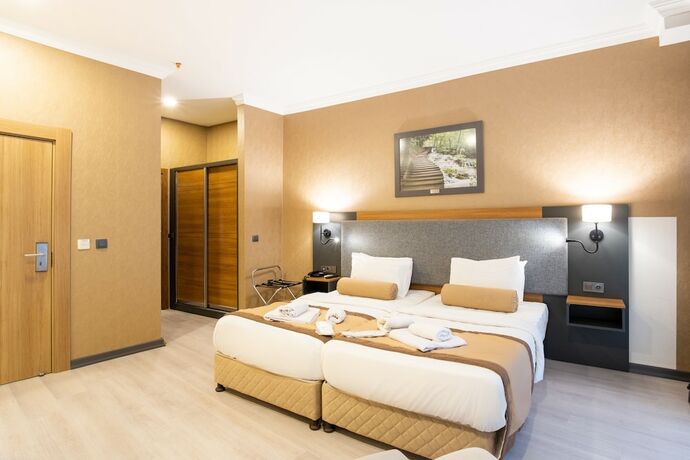 Imagen de la habitación del Orange Hotel. Foto 16
