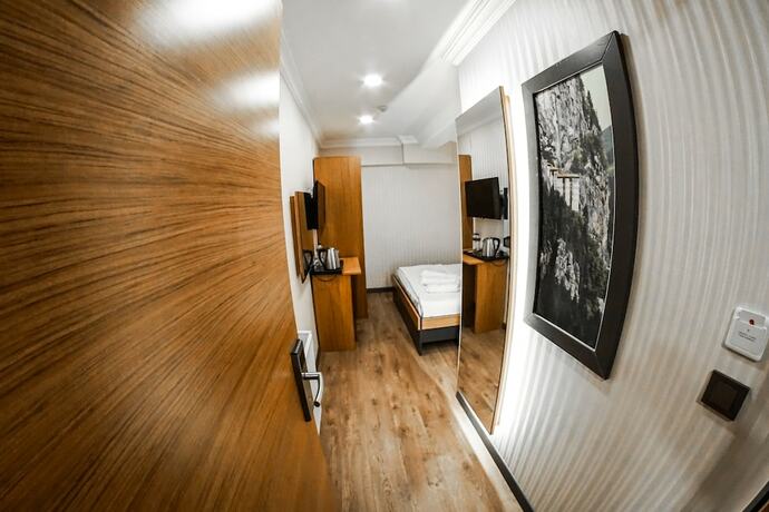 Imagen de la habitación del Orange Hotel. Foto 17