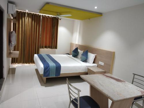 Imagen de la habitación del Orange Suites & Inn. Foto 11