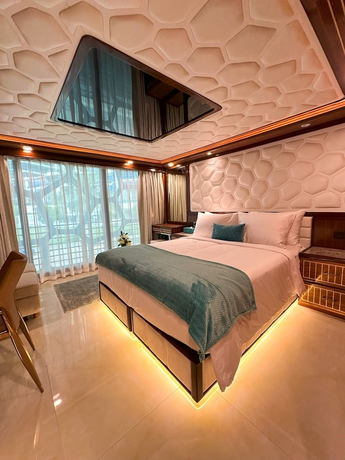 Imagen de la habitación del Orchid Overnight Superyacht. Foto 7