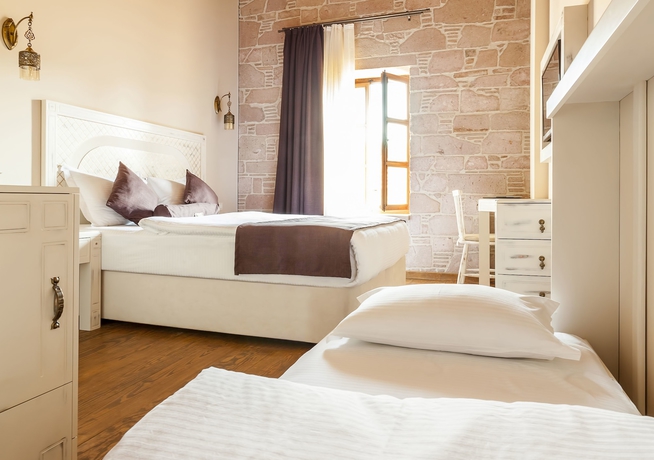 Imagen de la habitación del Orchis Hotel. Foto 11