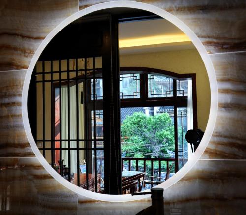 Imagen de la habitación del Oriental Inn Phoenix Puyuan Branch. Foto 5