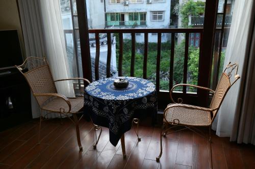 Imagen de la habitación del Oriental Inn Phoenix Puyuan Branch. Foto 6