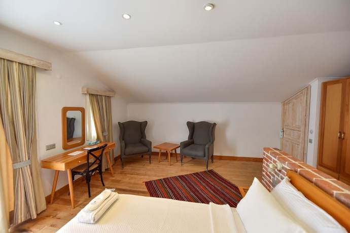 Imagen de la habitación del Orino Suites. Foto 9