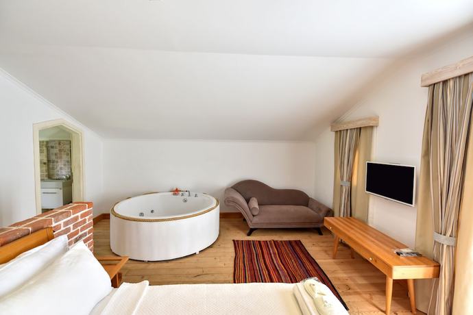 Imagen de la habitación del Orino Suites. Foto 11