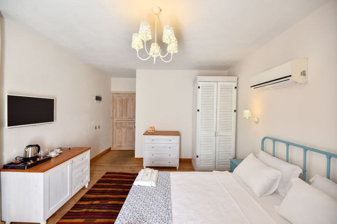 Imagen de la habitación del Orino Suites. Foto 16