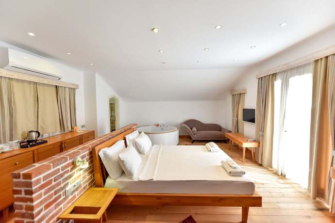 Imagen de la habitación del Orino Suites. Foto 18