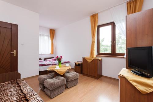 Imagen de la habitación del Ośrodek Wypoczynkowy AS PIK dawniej Hotel AS PIK. Foto 13