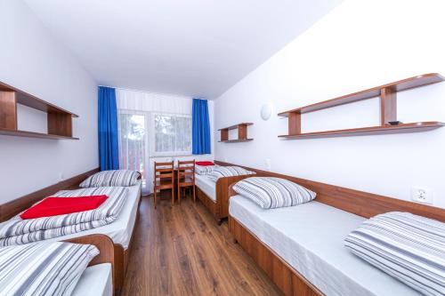 Imagen de la habitación del Ośrodek Wypoczynkowy Diuna. Foto 6