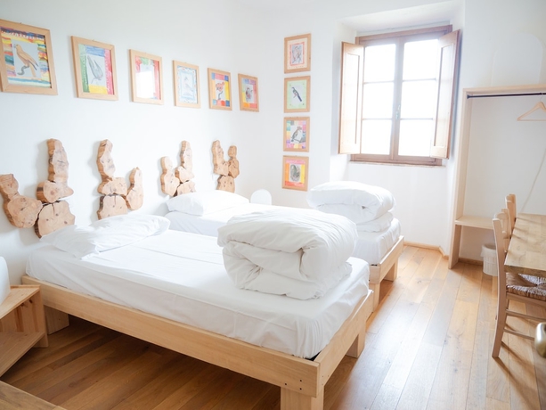 Imagen de la habitación del Ostello Bello Assisi Bevagna. Foto 11