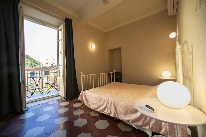 Imagen de la habitación del Ostello Palazzo Nizza. Foto 6