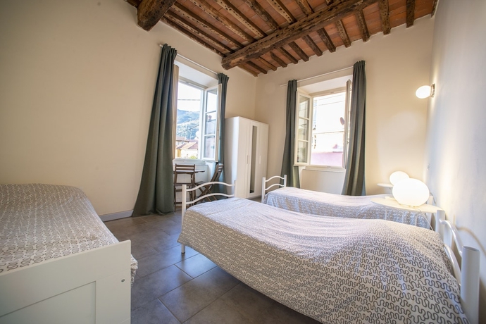 Imagen de la habitación del Ostello Palazzo Nizza. Foto 11