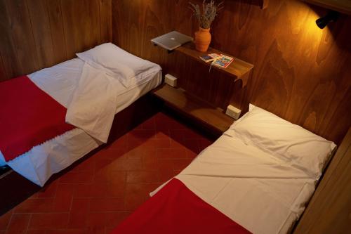 Imagen de la habitación del Ostello del Bigallo. Foto 9