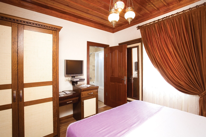 Imagen de la habitación del Otantik Hotel. Foto 9