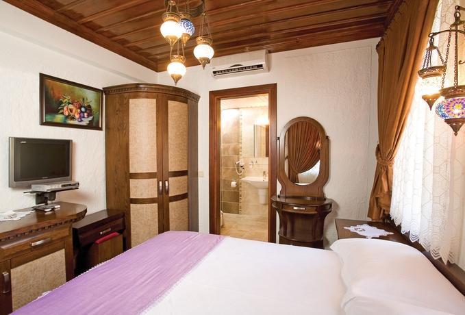 Imagen de la habitación del Otantik Hotel. Foto 10