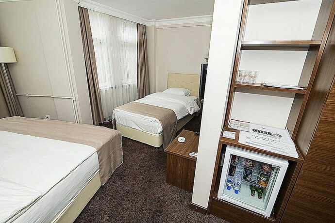 Imagen de la habitación del Otel 59. Foto 16