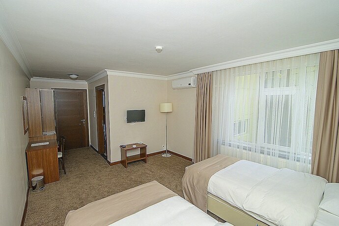 Imagen de la habitación del Otel 59. Foto 18