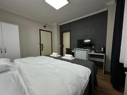 Imagen de la habitación del &Ouml;zdemir Inn Otel. Foto 19